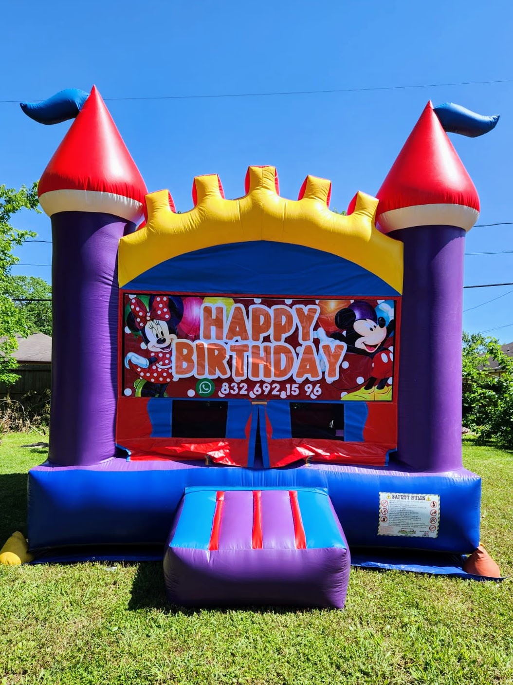 Purple moonwalk with a Happy Birthday banner